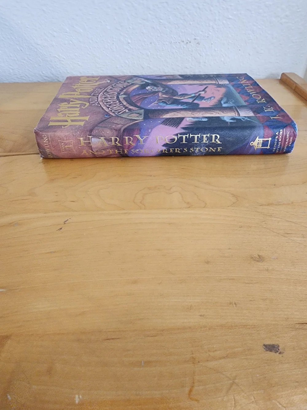 Harry Potter and the Sorcerer's Stone by J.K. Rowling - Purple Cover